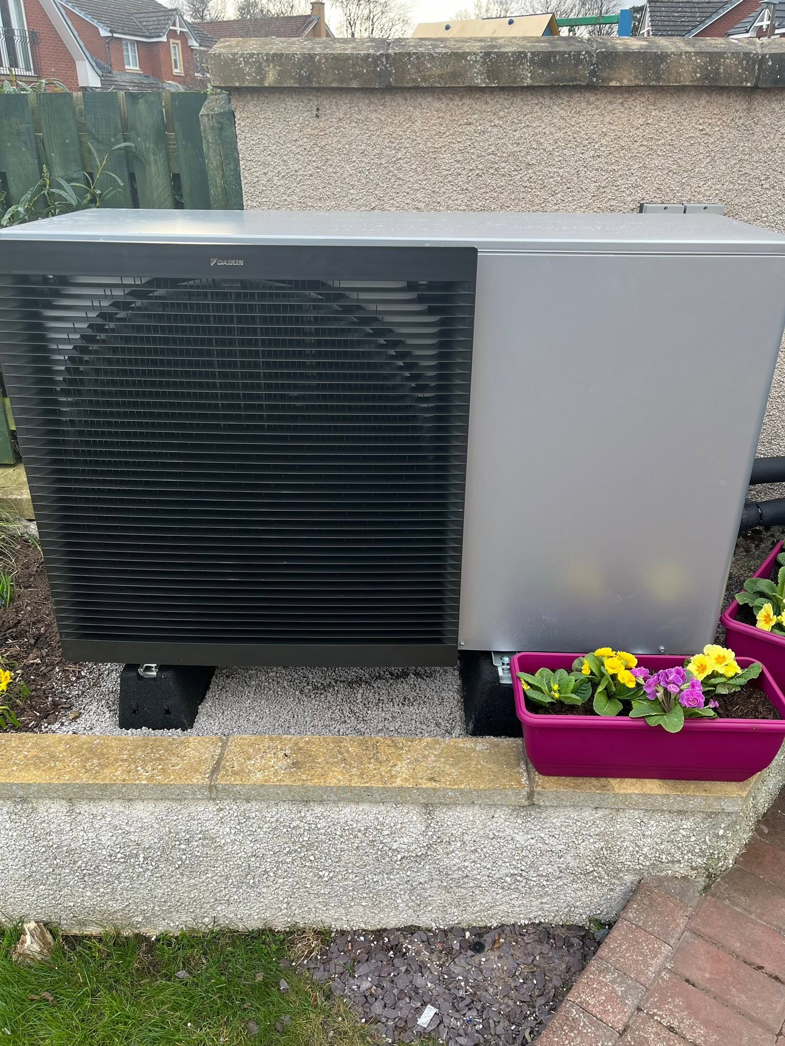 Air source heat pump servicing by FLO Renewables